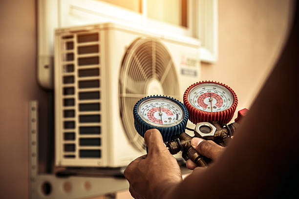 Professional Hvac technician working in Lehigh Acres, FL